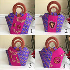 Nina Hand Woven Raffia Fibers African Print Basket Bag with Wood Handle - Purple / Pink